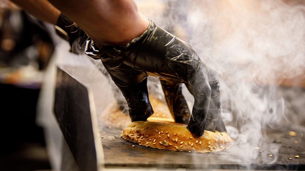 Industrial strength nitrile gloves are the best way to ensure food safety when handling food in restaurants, kitchens, or any food service facility.