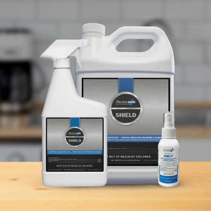 Various sizes of PermaSafe SHIELD bottles which safely prevents the growth of bacteria, mold, fungi, algae, and more for up to 3 months